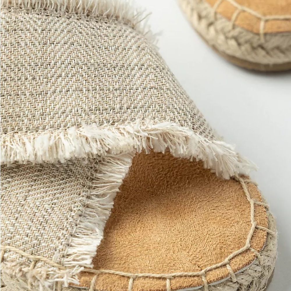 Minnetonka Women's Cream Slip-On Sandals - Picture 3 of 12